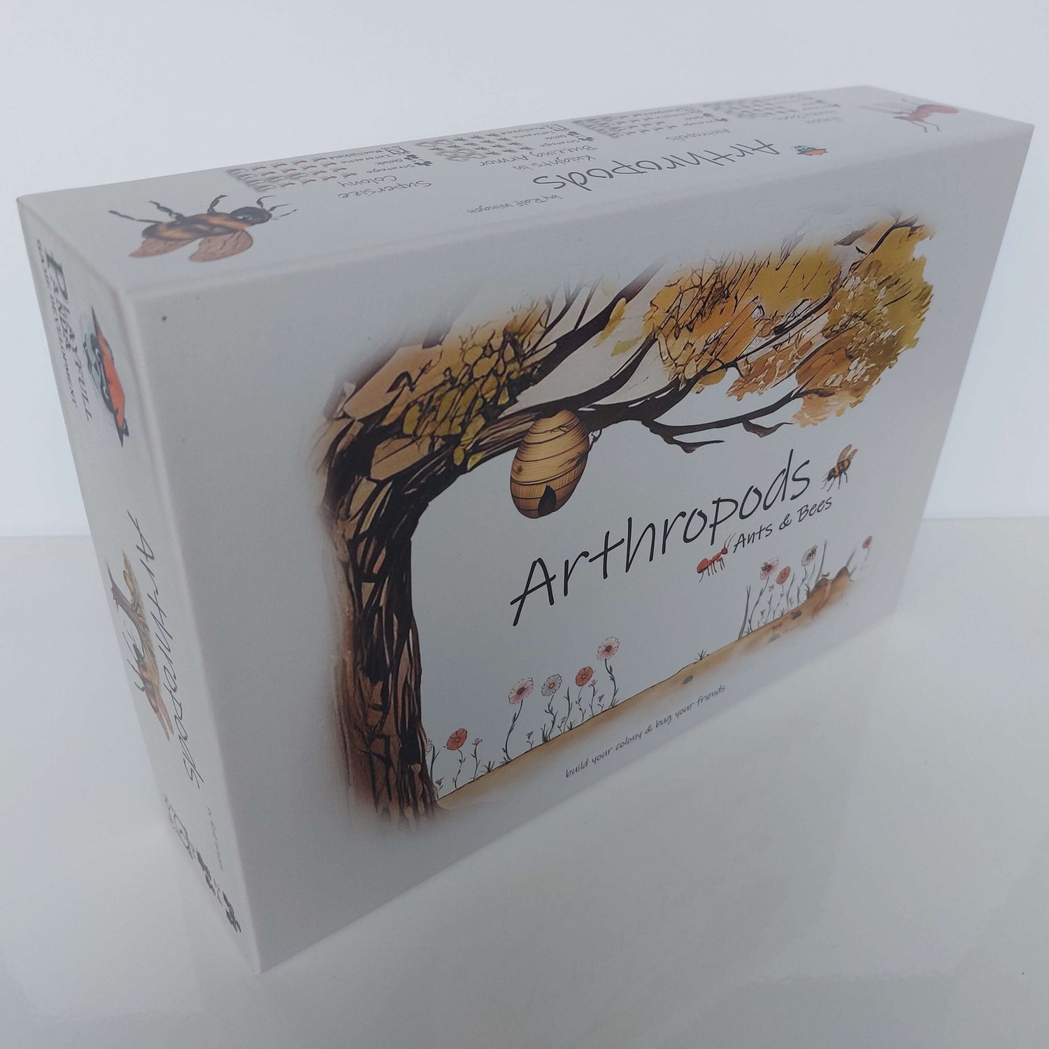 Box design of Arthropods: Ants & Bees board game featuring a tree and bees, emphasizing interactive gameplay.