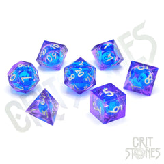 Blue Bane Liquid Core RPG dice set with sparkling blue liquid and purple resin in various shapes.